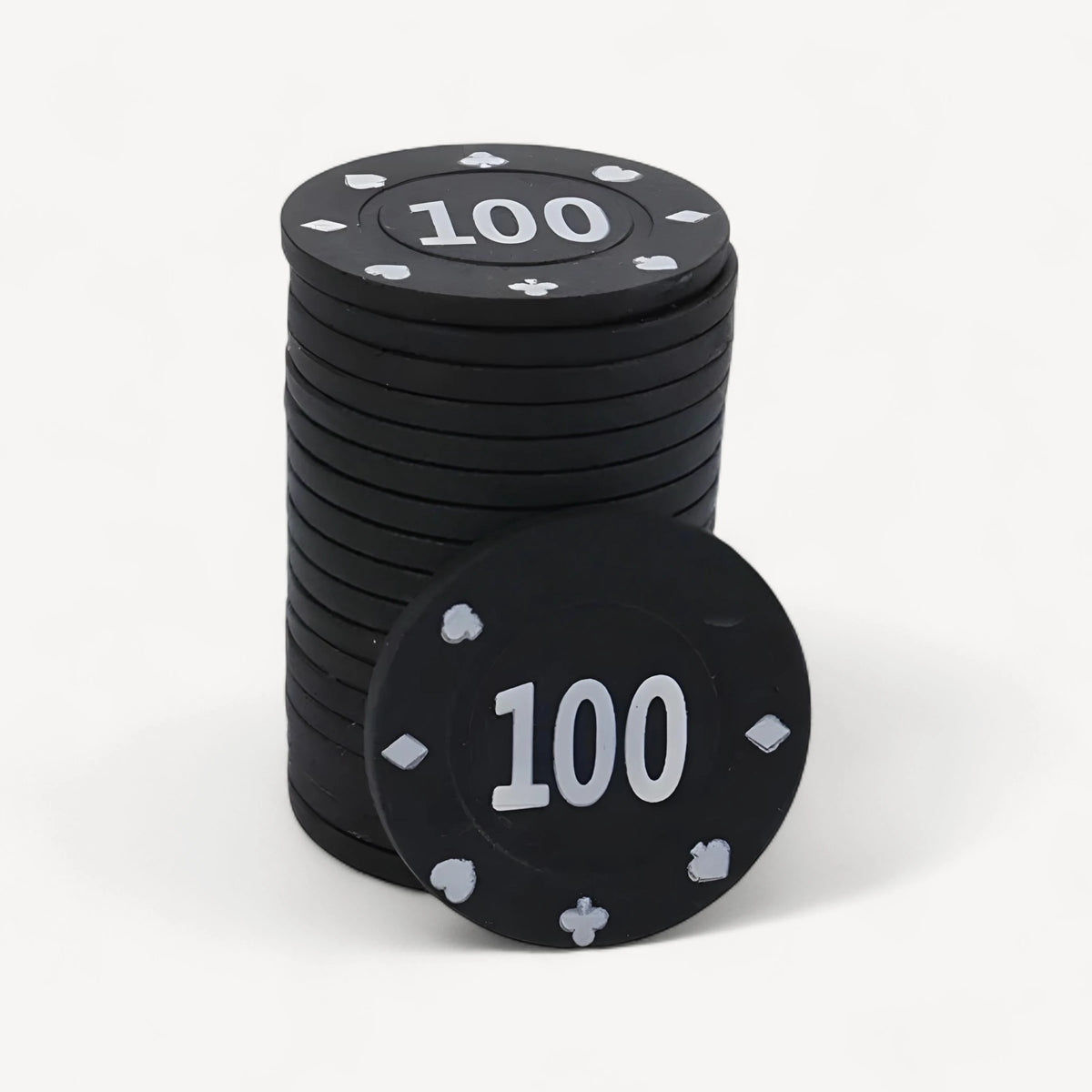 A stack of black Acorn chips of value 100, white numbers and suit symbols, one chip propped in front