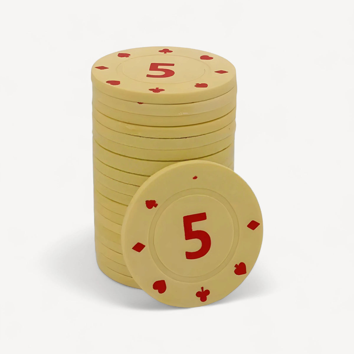 Mahjong chips in yellow: a stack of 5-value chips with red numbers and card suit symbols, one chip in front