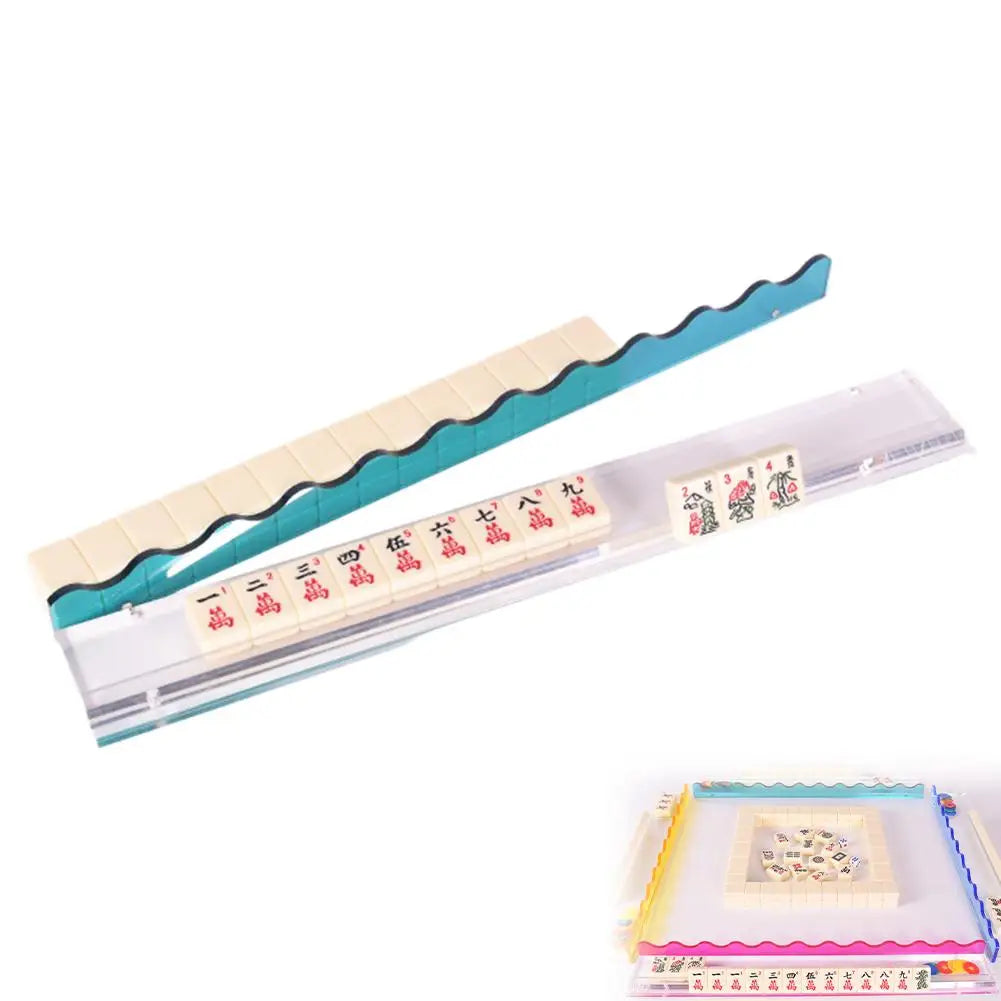 Teal Aspen rack with the wavy teal pusher swung out over a wall of tiles, and an inset of a set table below
