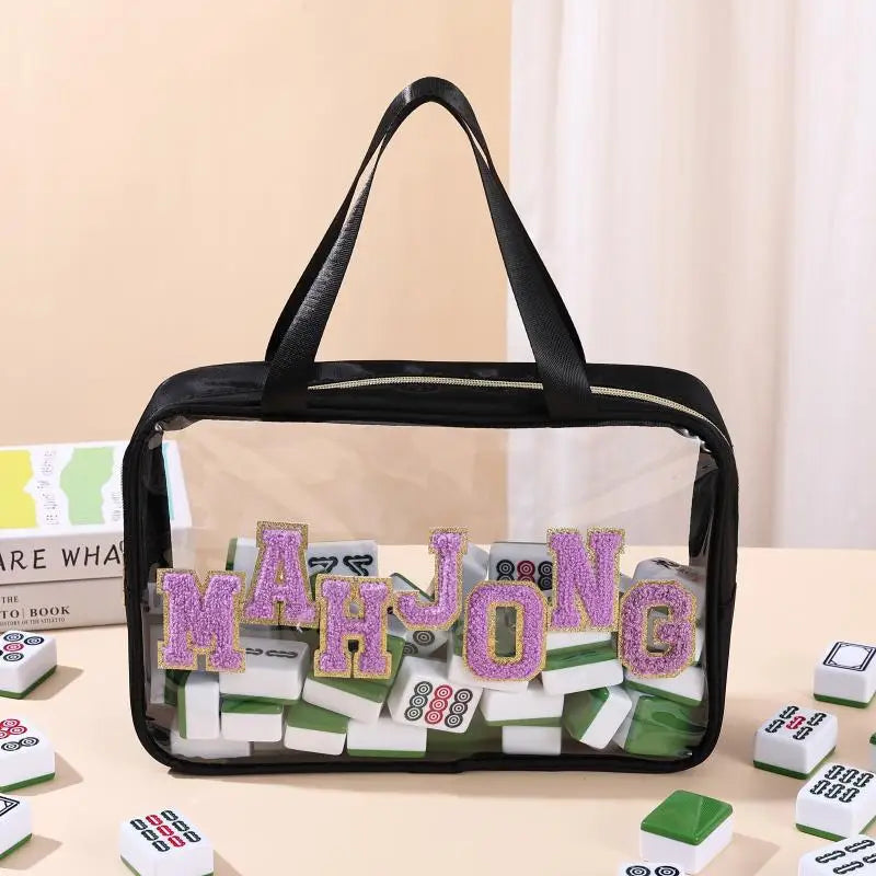Coir with black trim and handles, lilac chenille MAHJONG letters edged in gold over a load of tiles