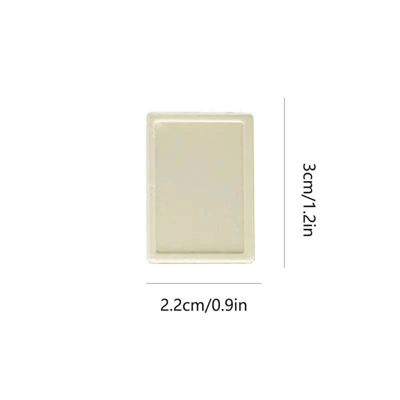 Single cream Elm tile with a raised border, its height marked at 3 cm and its width at 2.2 cm