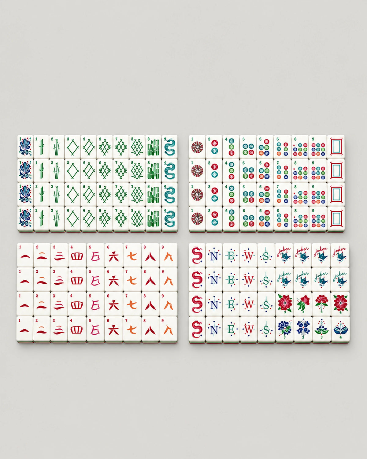 Fuchsia mahjong tiles, magenta backs, the full set laid out