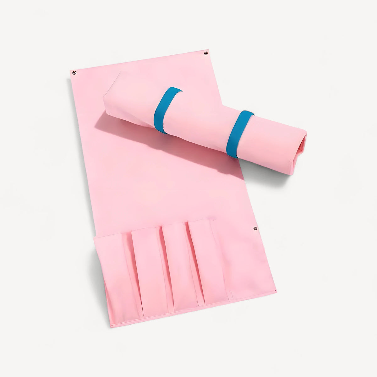 Mahjong rack storage bag in pink: one laid open with four pockets, one rolled and held by blue straps