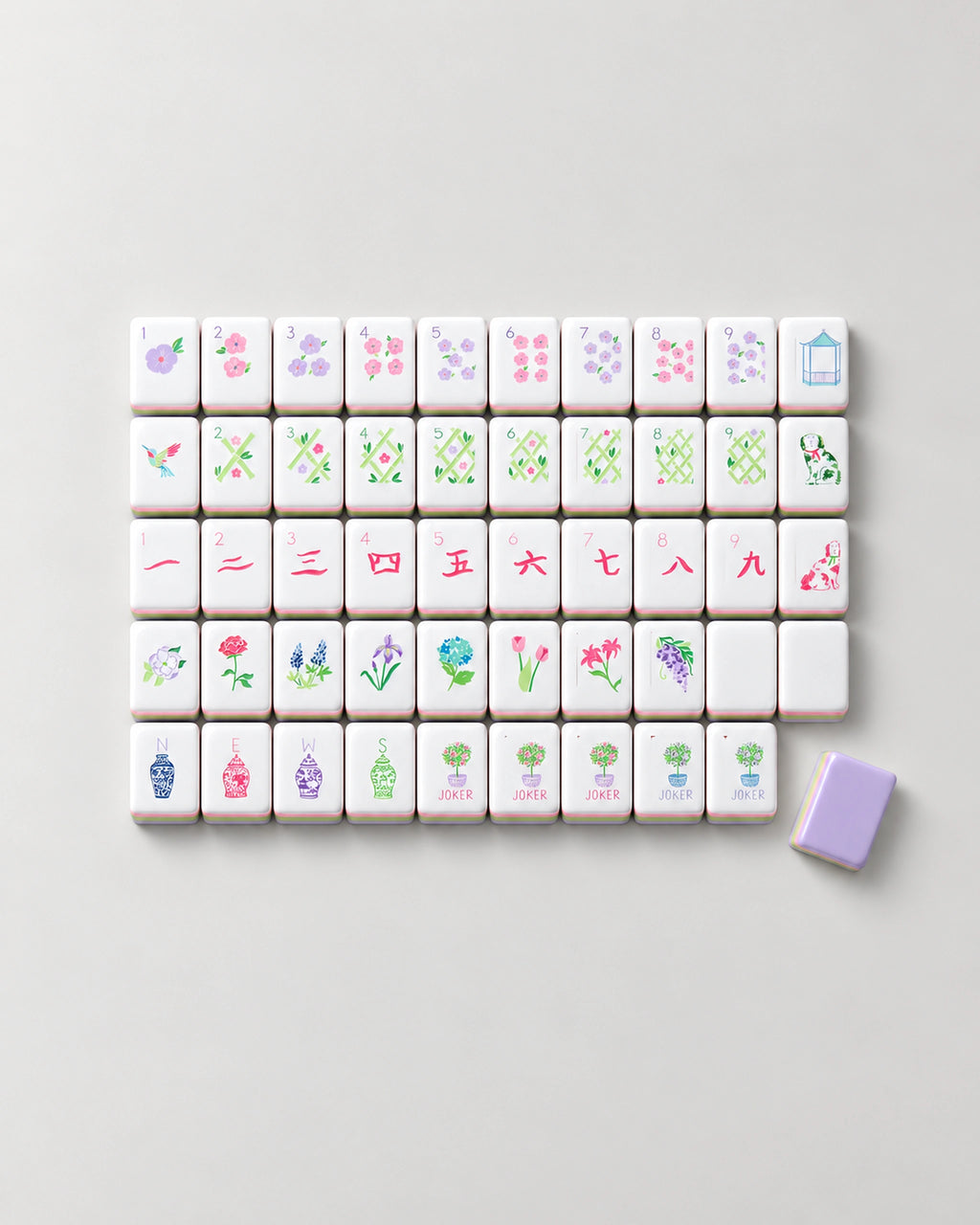 Lavender mahjong tiles in rows: flower dots, green lattice bams, pink craks, ginger jar winds and topiary Jokers