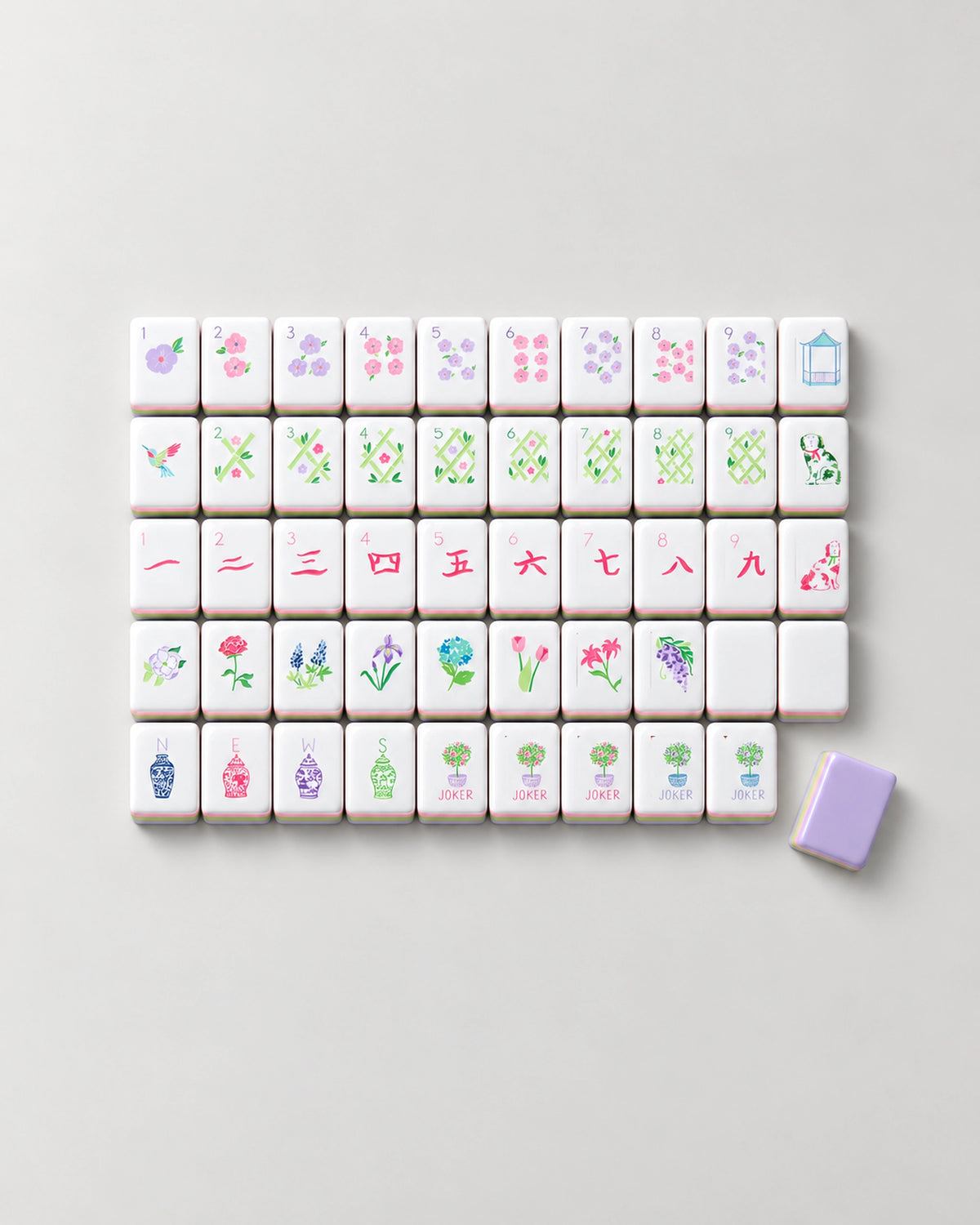 Lavender mahjong tiles in rows: flower dots, green lattice bams, pink craks, ginger jar winds and topiary Jokers