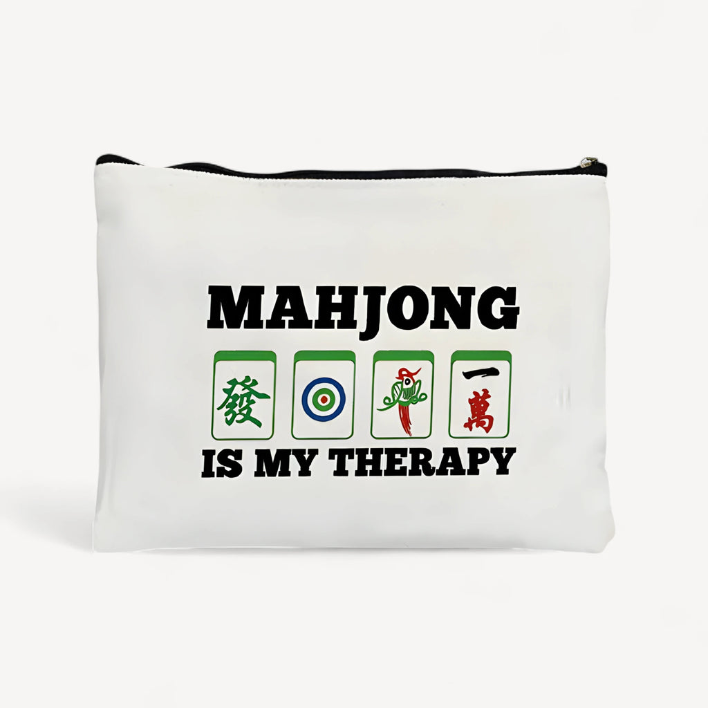 Linen pouch printed Mahjong Is My Therapy in black over a row of four colorful tiles