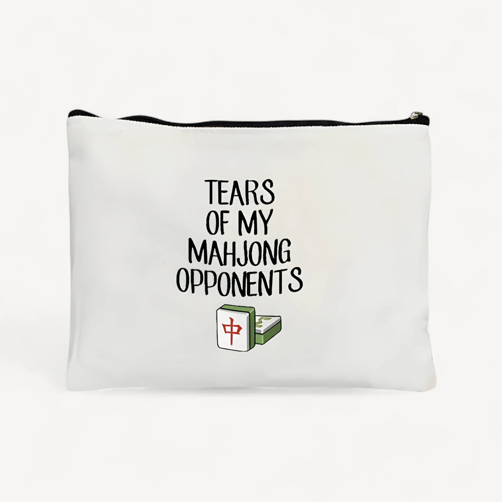 Linen pouch printed Tears of My Mahjong Opponents above a red dragon tile, closed with a black zipper
