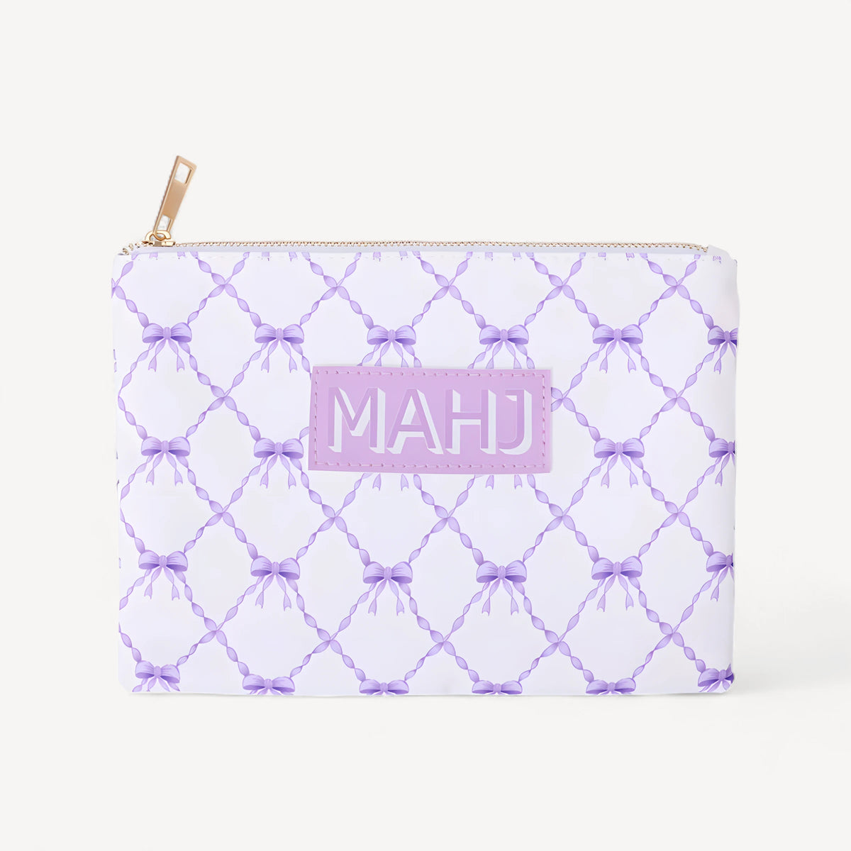 Raffia in white with a purple bow lattice print and a lilac MAHJ patch on the front
