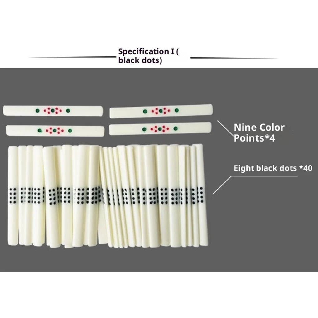 Black Dots contents of Rattan: 40 ivory sticks with eight black dots and 4 sticks with nine red and green dots