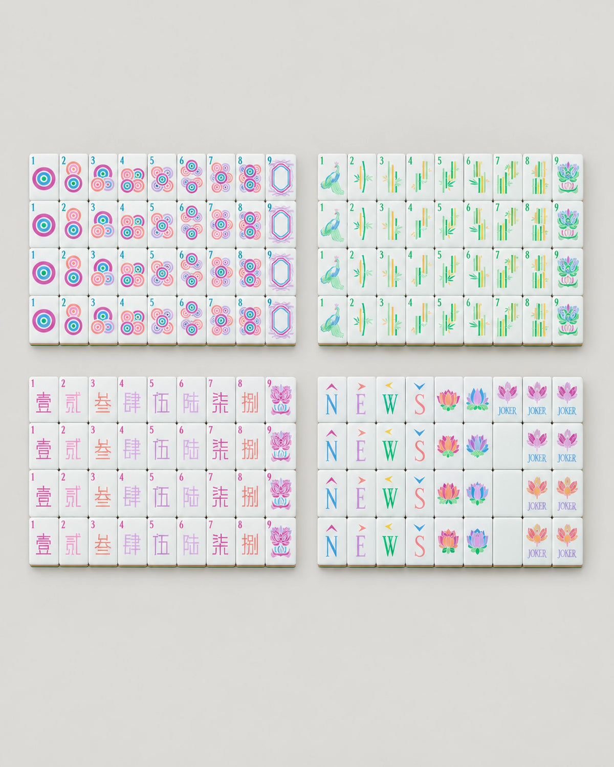 Sherbet mahjong tiles, butter yellow backs and lotus jokers, the full set laid out