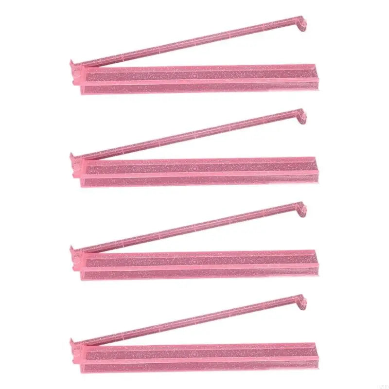 Pink Glitter finish: four sparkly pink Snowdrop racks, arms rising from the left end of each