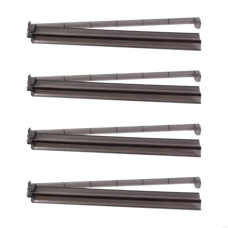 Smoke Black finish: four dark translucent Snowdrop racks, pusher arms angled away from the body