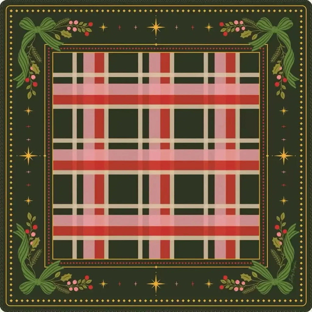 Christmas mahjong mat seen from above: pink and red tartan on fir green, with holly, bows and gold stars on the border